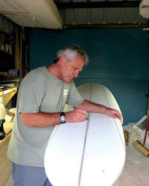 Steve Walden Shaping Surfboard in Shop in Ventura, CA